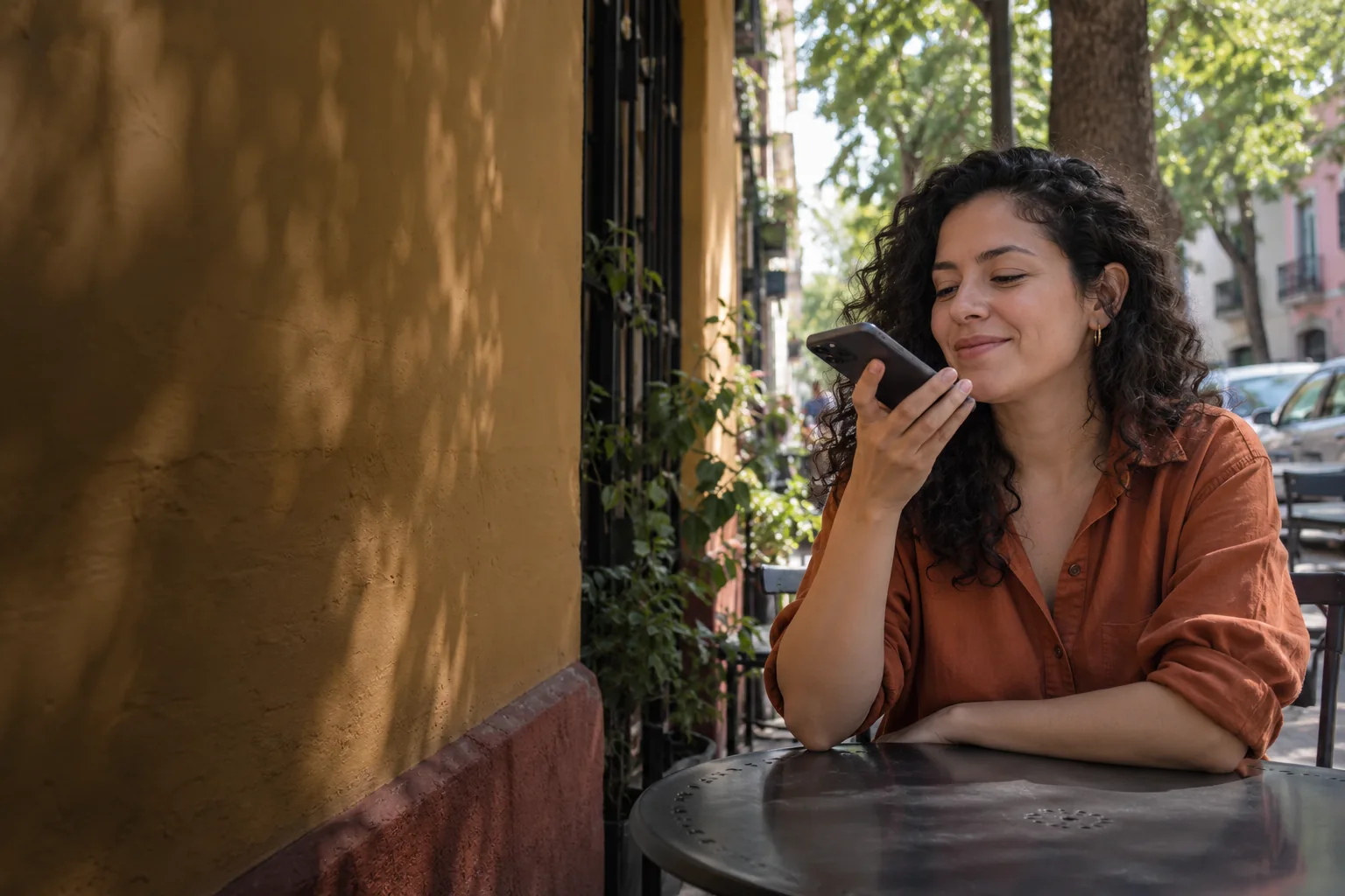 A business owner shares a recommendation from a café terrace.
